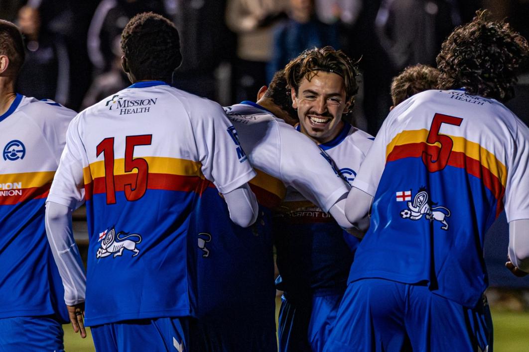 Asheville City SC players celebrate after defeating Greenville Triumph SC to claim their first Open Cup victory | Photo courtesy Asheville City SC