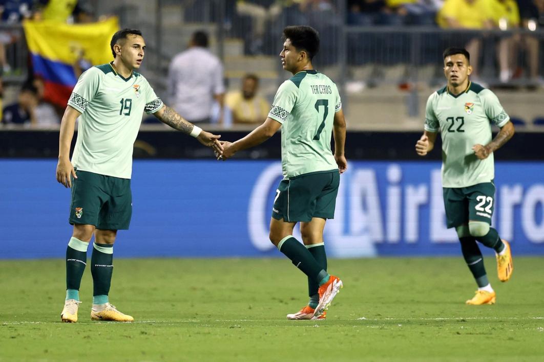 three bolivian players on the field