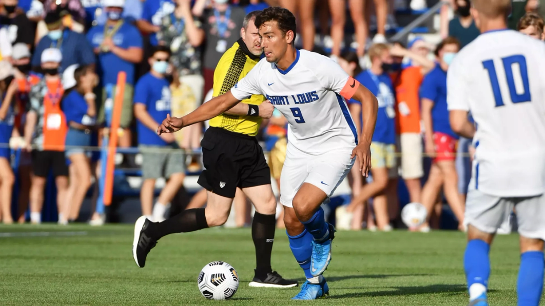 Becher with the Billikens of SLU | Photo courtesy Bill Barrett/Saint Louis University
