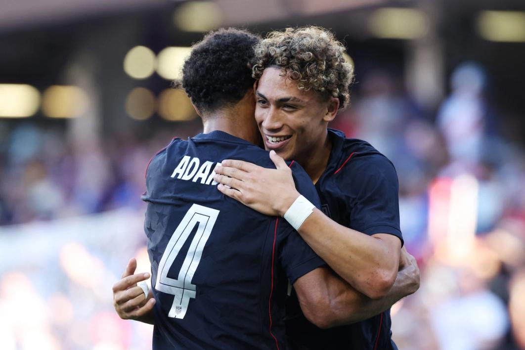 Tyler Adams #4 congratulates Julian Hall #19 after scoring his team's third goal vs. Peru at Inter.co Stadium (Photo by Taylor Banner/USSF/Getty Images)