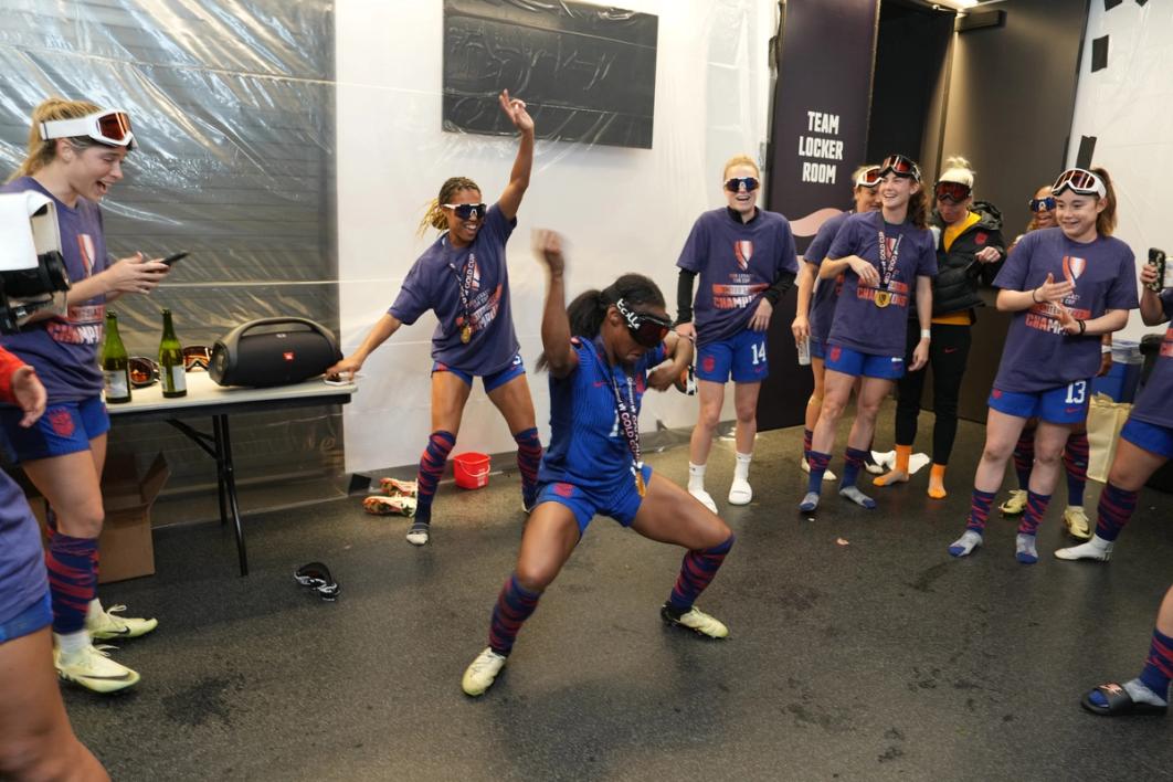 Crystal Dunn dances