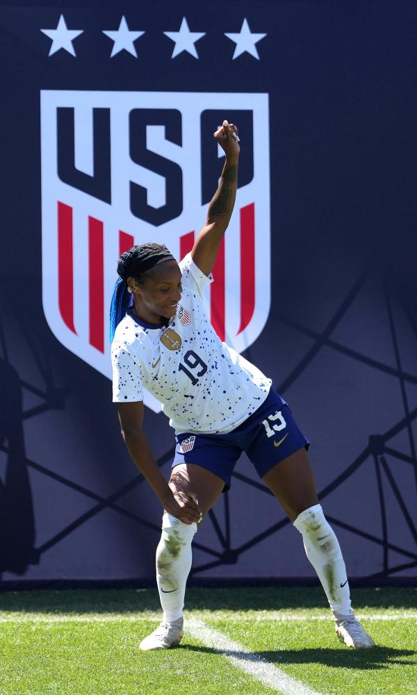 Crystal Dunn dances