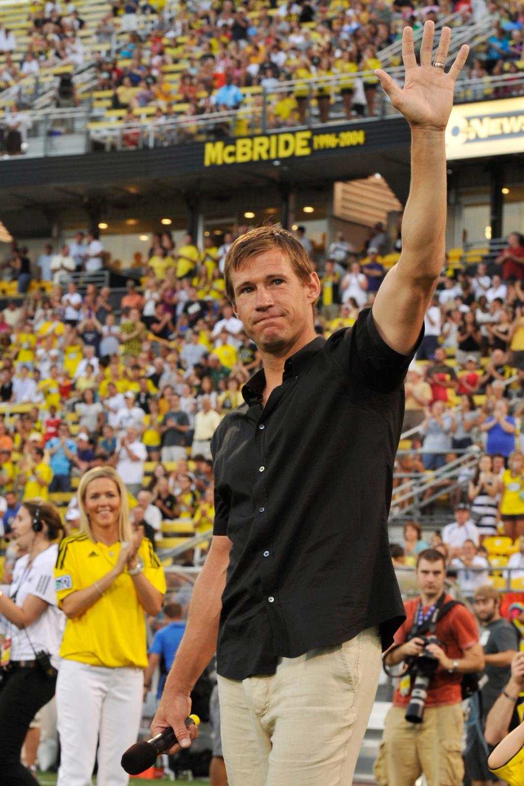 Brian McBride and his family stand at midfield as McBride is inducted in the Crew's Circle of Honor on July 16, 2011 at Crew Stadium in Columbus, Ohio | Photo by Jamie Sabau/Getty Images