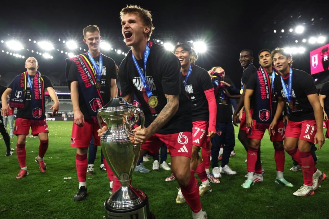 COLUMBUS, OHIO - OCTOBER 21: Conrad Wallem #6 of ST Louis City SC celebrates with the trophy after winning the Lamar Hunt U.S. Open Cup 2026 final at ScottsMiracle-Gro Field on October 21, 2026 in Columbus, Ohio. (Photo by Andy Lyons/Getty Images)