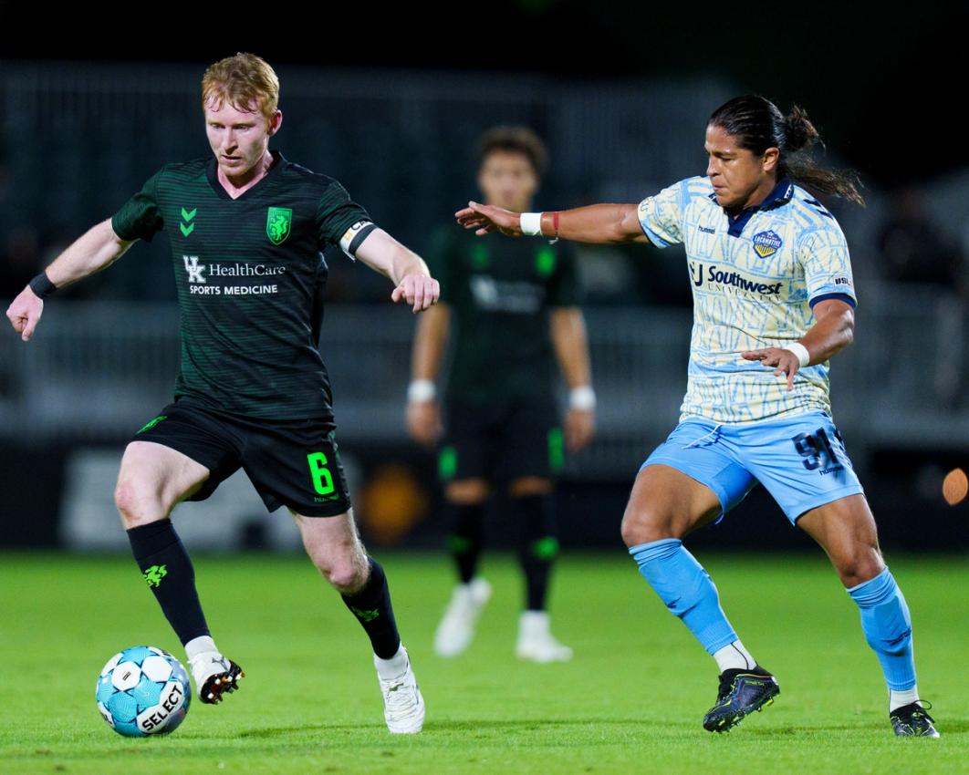 Lexington SC’s Aaron Molloy dribbles past El Paso Locomotive FC’s Cristo Fernández at Lexington SC Stadium on Oct. 3 | Photo courtesy of USL