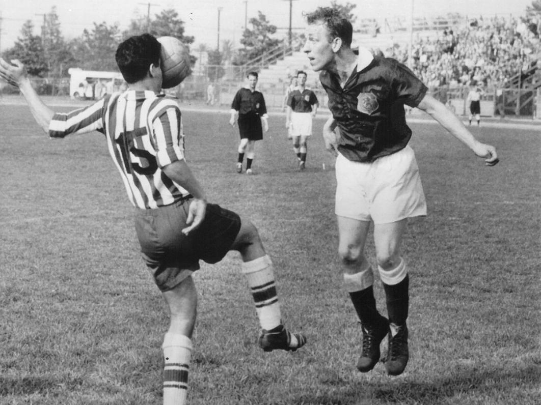 Kenny Fewings (right) of the Los Angeles Scots battles with Ruben Mendoza of St. Louis Kutis in the 1954 U.S. Open Cup Semifinals at Rancho Cienega