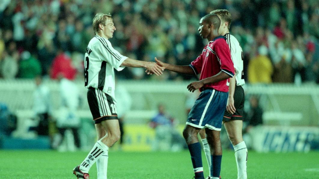 Germany’s Jurgen Klinsmann shakes hands with Eddie Pope after the World Cup group stage match between Germany and USA at the Parc des Princes on June 15, 1998, in Paris, France. (Photo by Simon Bruty/Anychance/Getty Images)